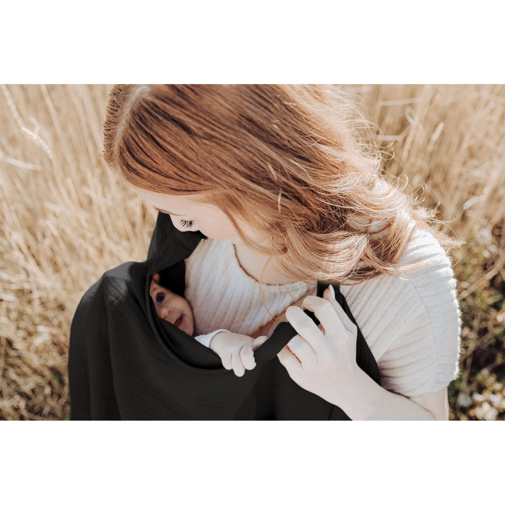Konssy nursing cover doubles as a car-seat canopy for sun and wind protection.