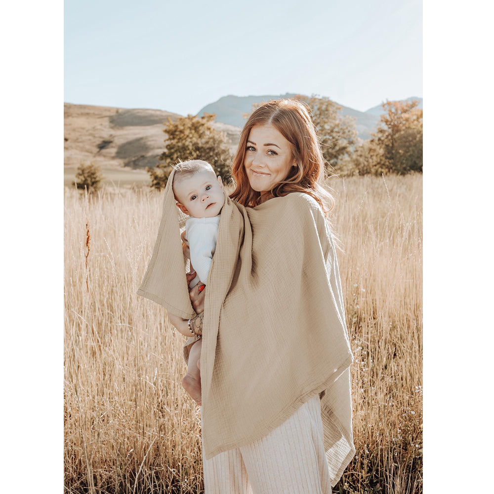 Konssy nursing cover car-seat canopy shields baby from sun and crowds while on the go.