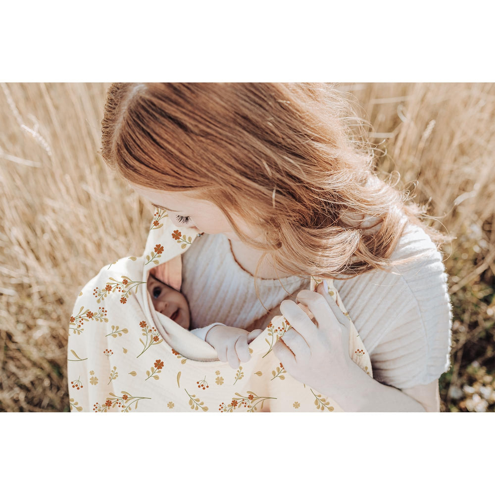 Konssy Muslin Nursing Cover car seat usage as a lightweight shield during rides.