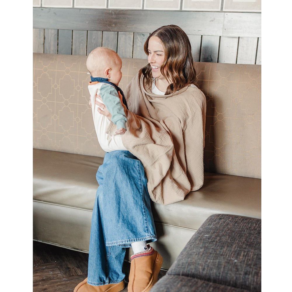 Konssy nursing cover folds compactly for travel.