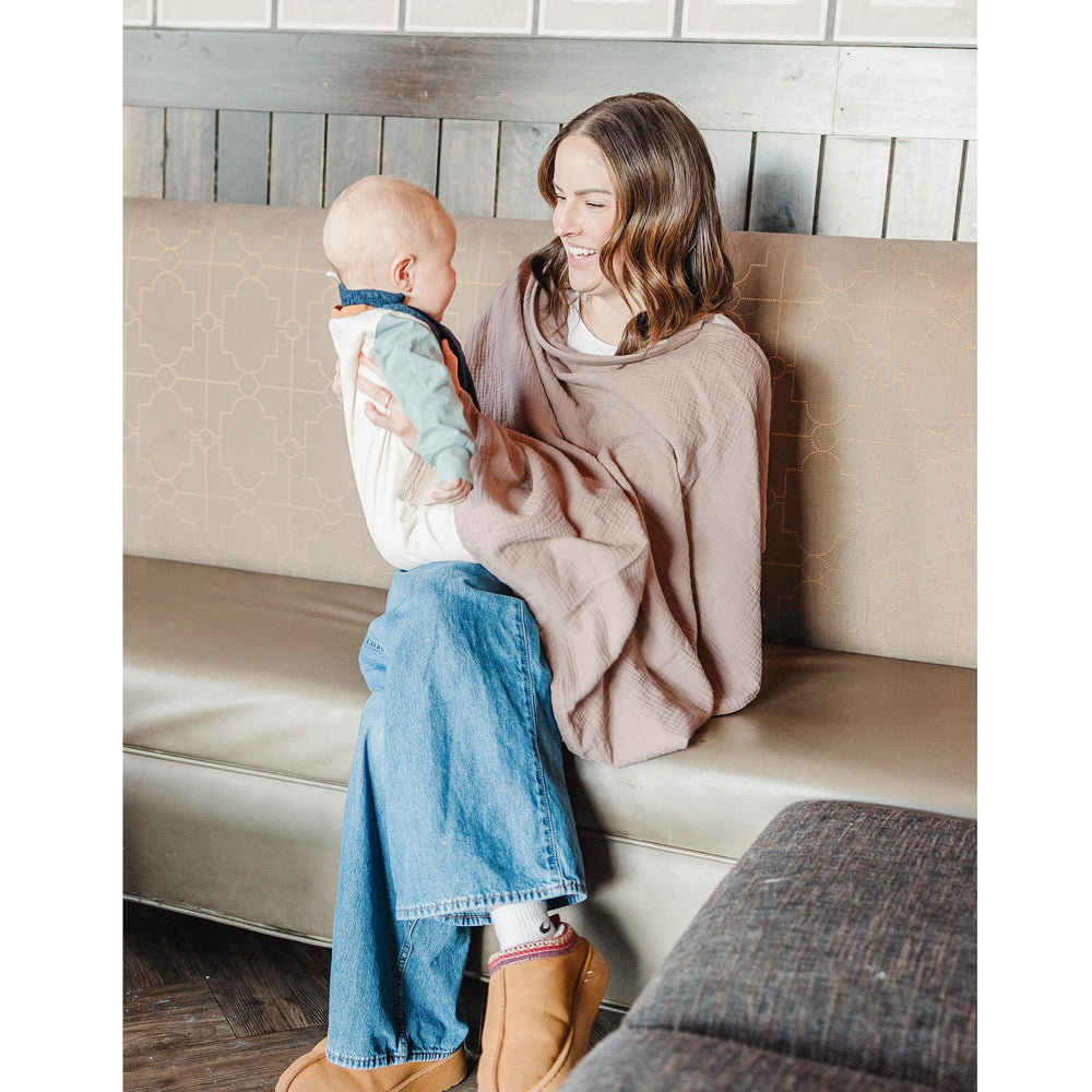 Konssy nursing cover 100% cotton muslin is machine washable.