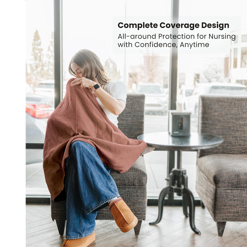 Konssy nursing cover showing privacy window for discreet breastfeeding in public.