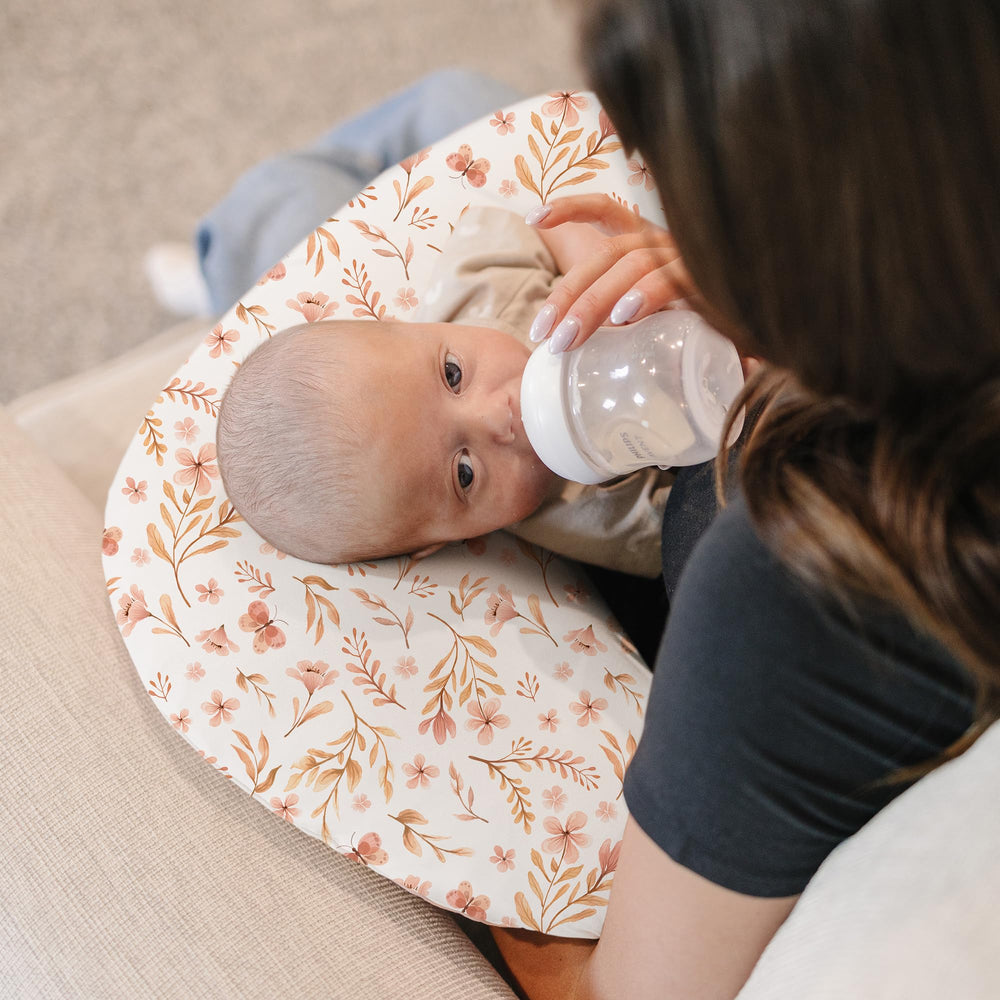 Konssy nursing pillow cover baby-feeding setup supports mom and baby during meals.