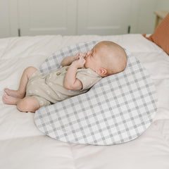 Konssy nursing pillow cover with elasticized edges shows snug fit and secure placement