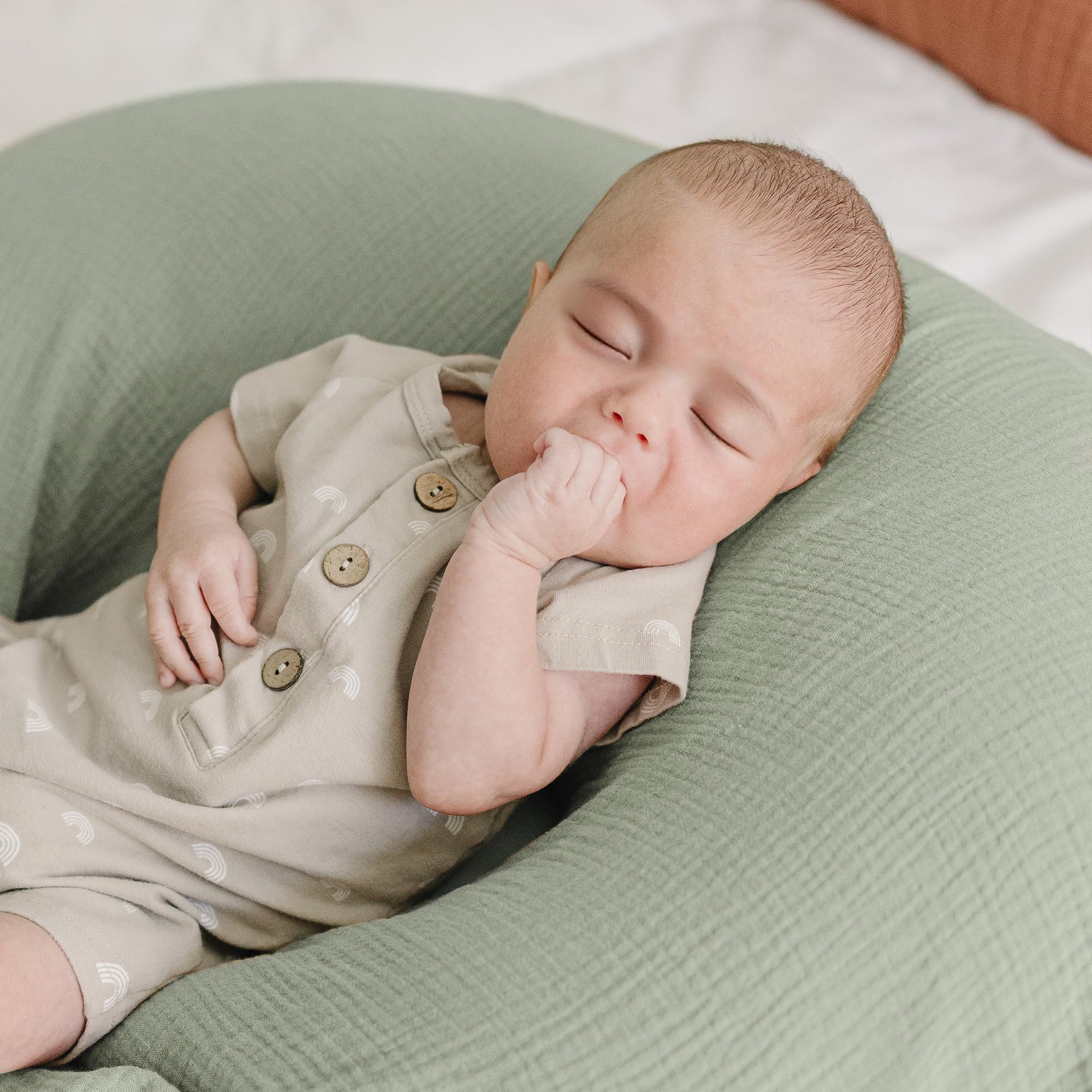 Konssy nursing pillow cover fits standard pillows for versatility.
