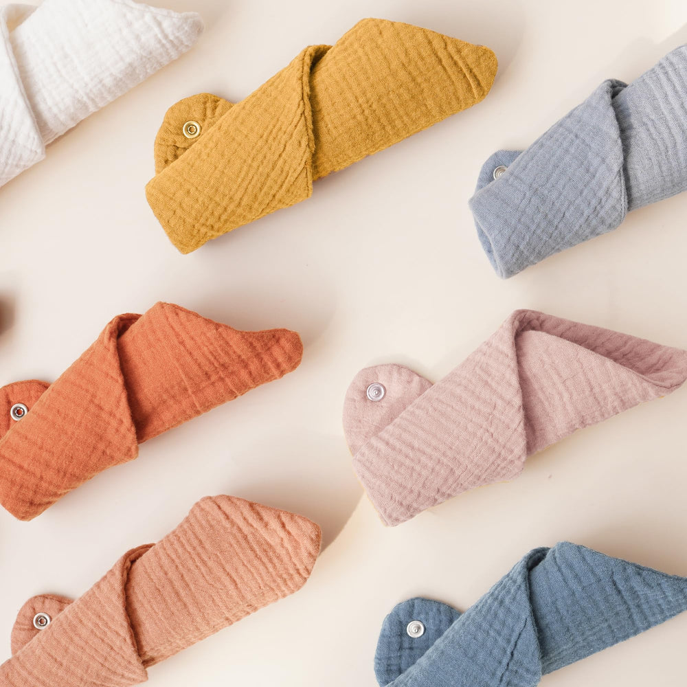 Konssy soft cotton bibs showcase gentle touch and reliable absorption for drool days.
