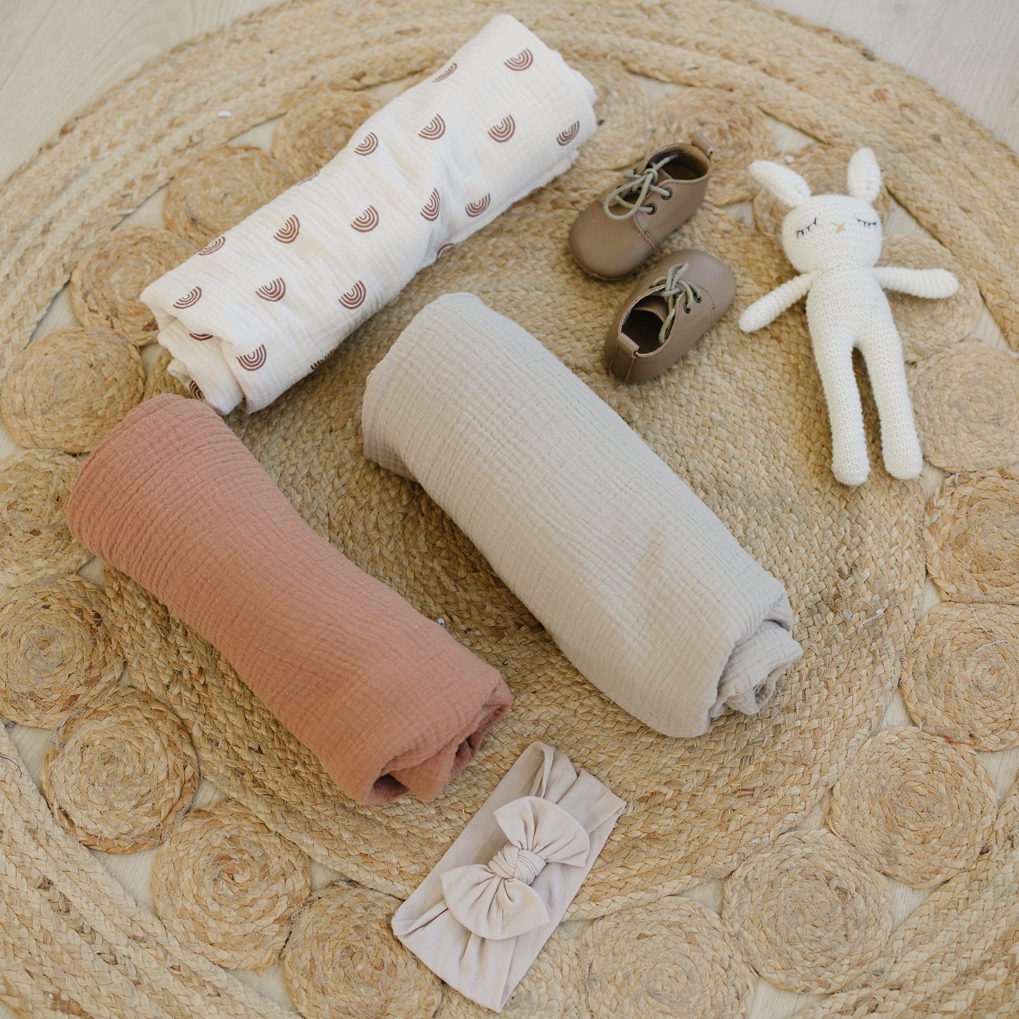 Konssy muslin blanket in nursery setup showcases multi-purpose use for feeding, shade, or stroller