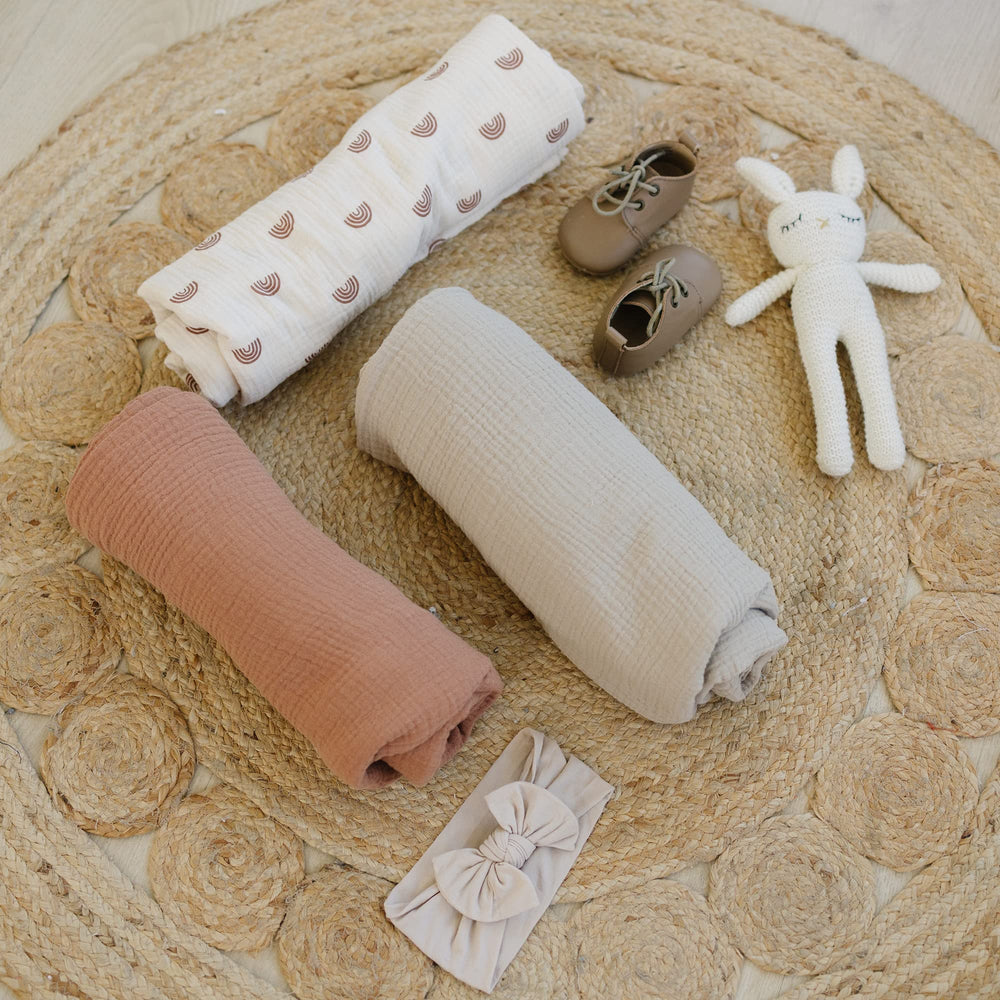 Konssy muslin blanket in nursery setup showcases multi-purpose use for feeding, shade, or stroller