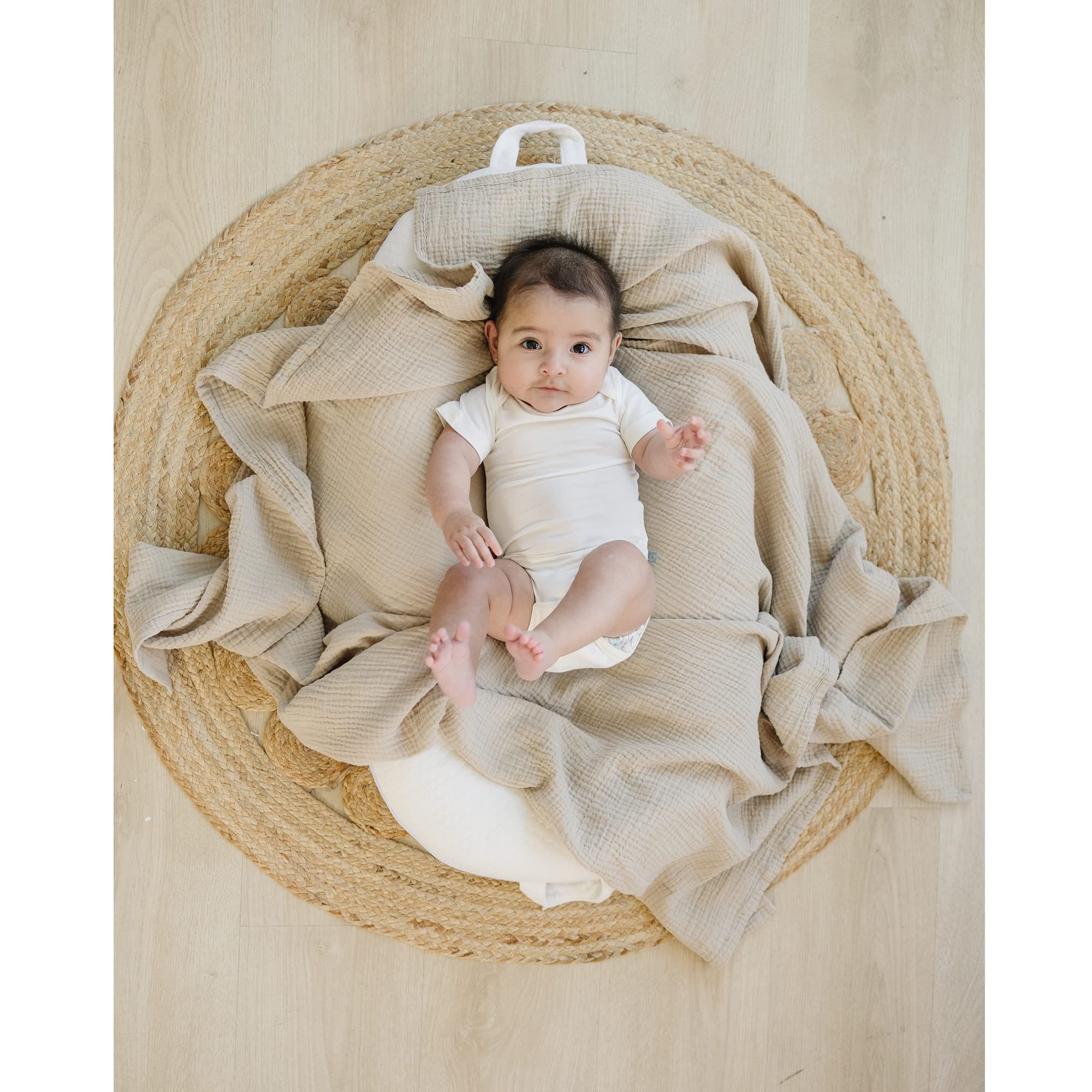 Konssy swaddle blanket used as photography prop highlights soft textures in baby portraits