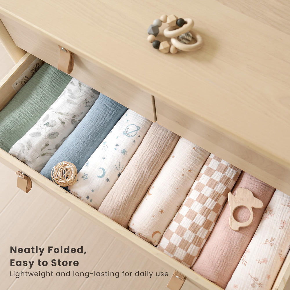 Konssy muslin swaddle as stroller cover providing lightweight sun shade protection.