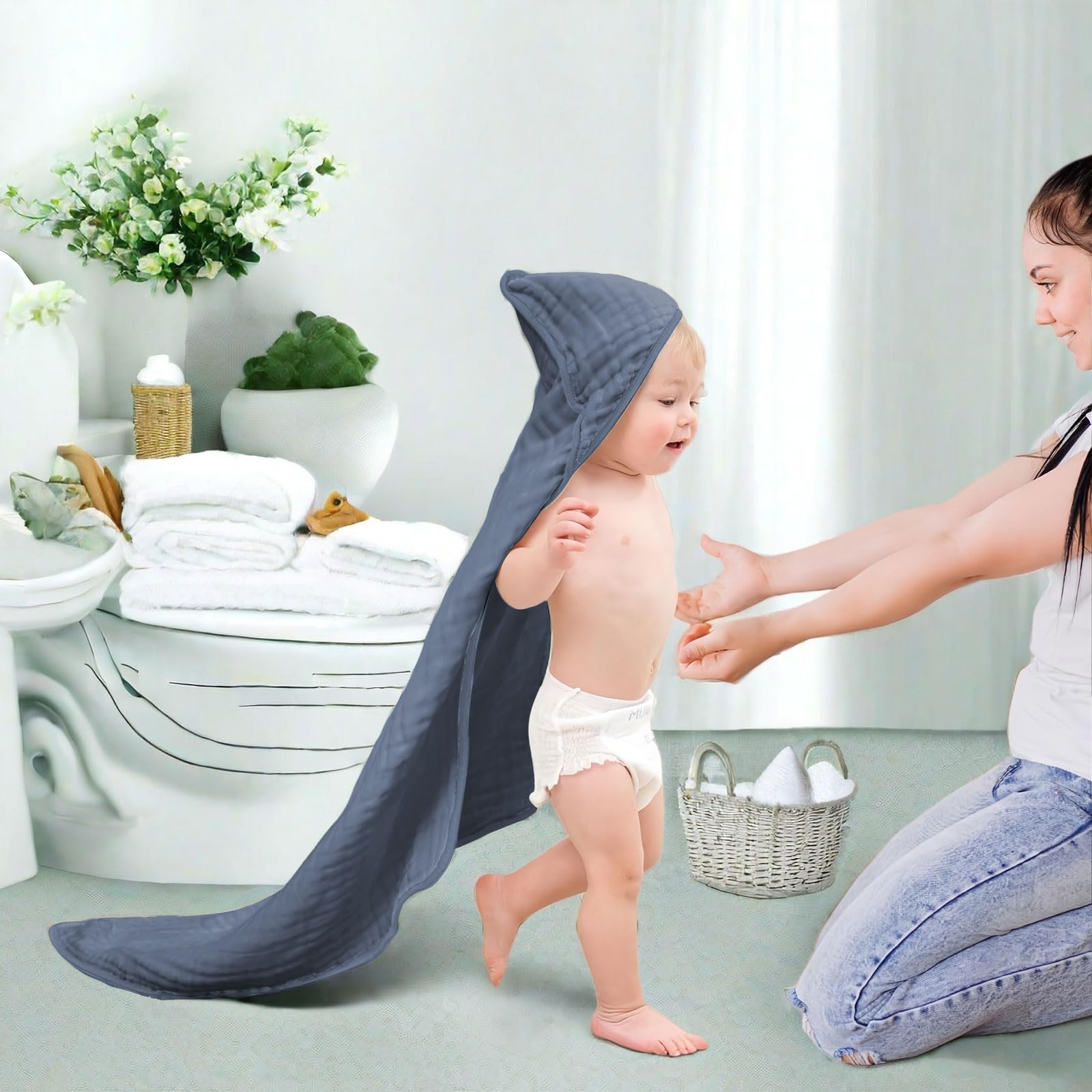 Koo-dib absorbent baby towel closeup emphasizes fast drying and soft touch