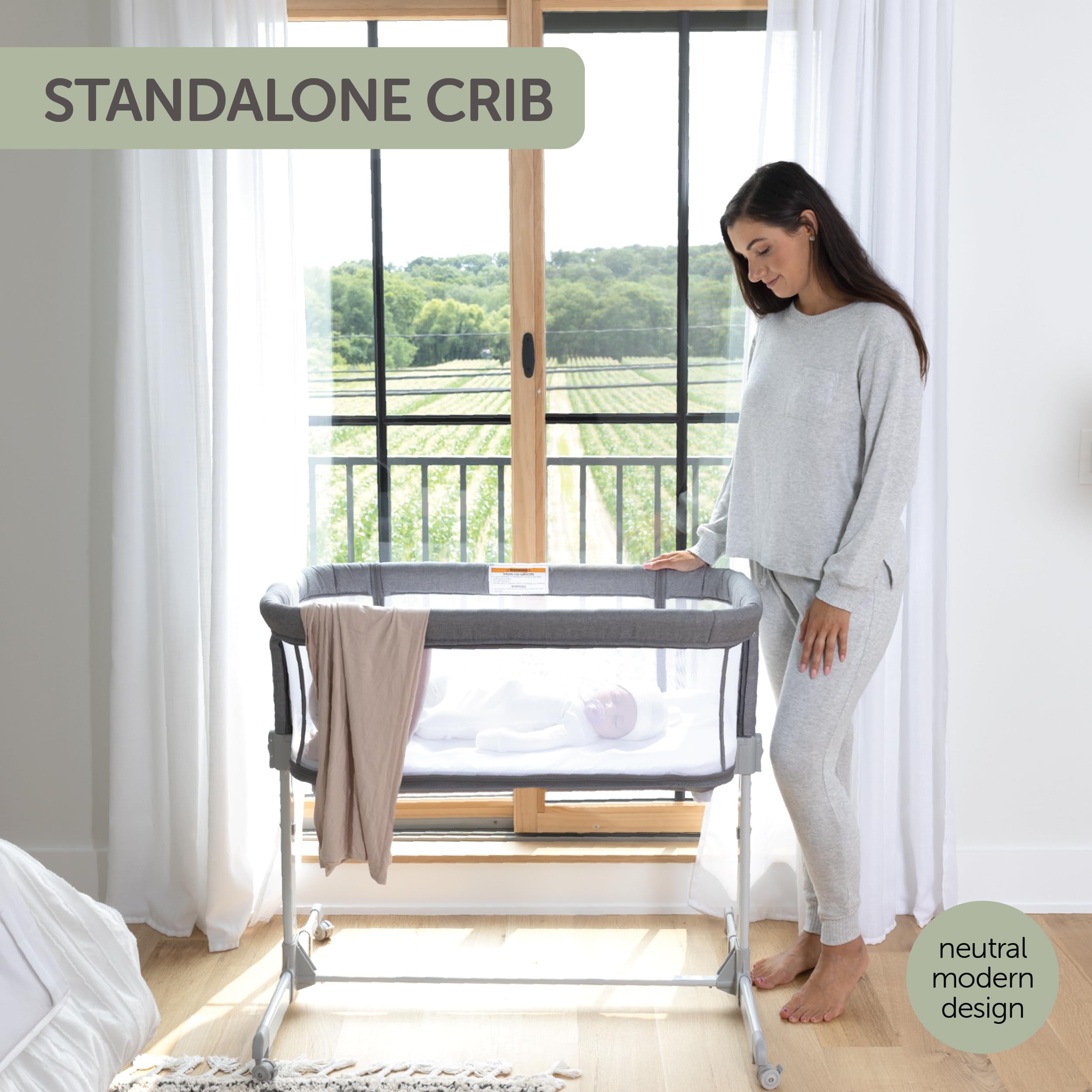 KoolaBaby adjustable five-height design adapts to bed height for easy newborn care.