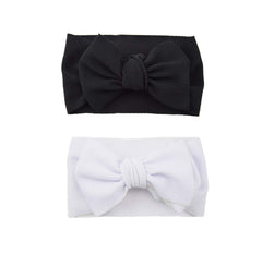 Koolgil baby Halloween bow headband flatlay showing soft fabric and bow