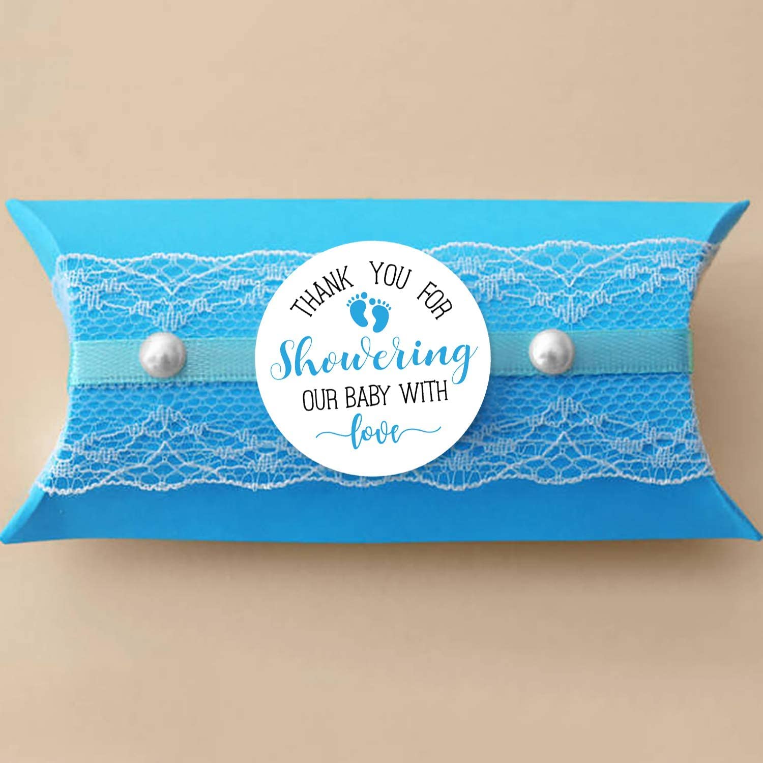 KORTTITALO thank you label for baby shower favors with blue feet motif.