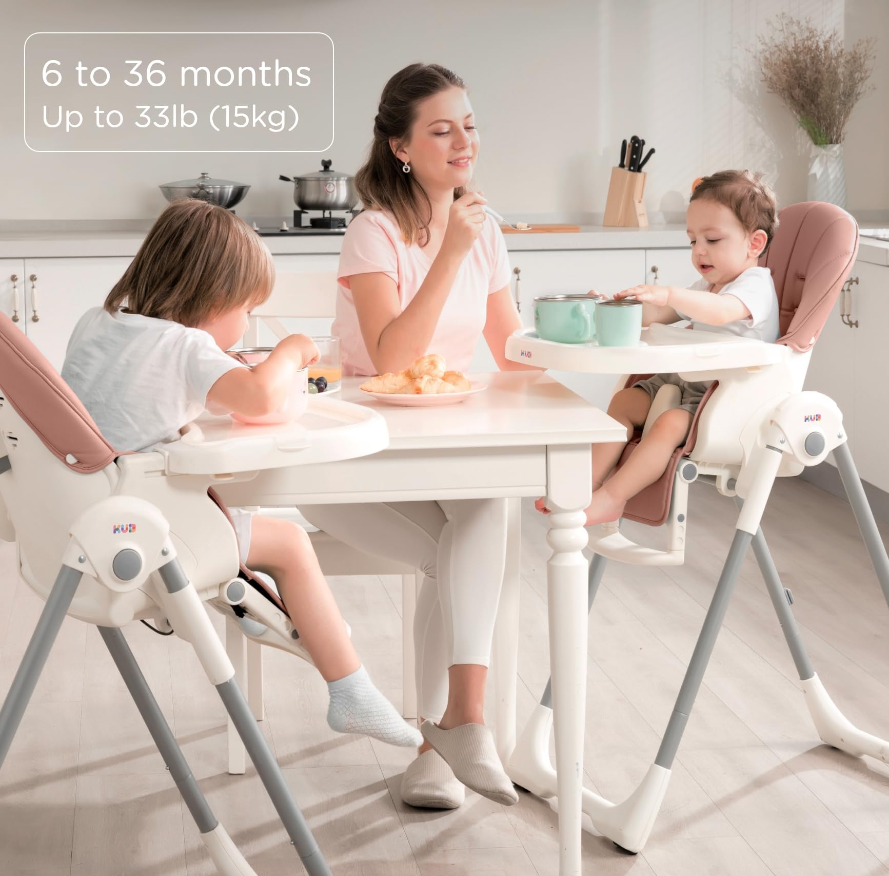 KÜB 3-in-1 foldable high chair washable cover for quick cleanup.