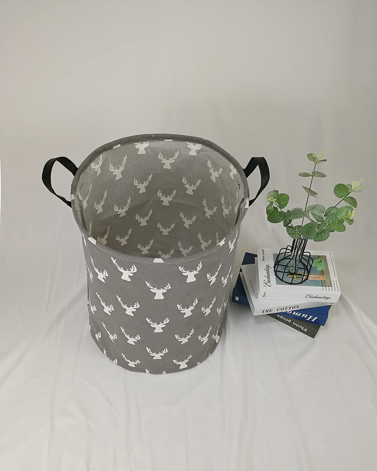 KUNRO laundry bin with handles enables portable laundry day and room-to-room transport.