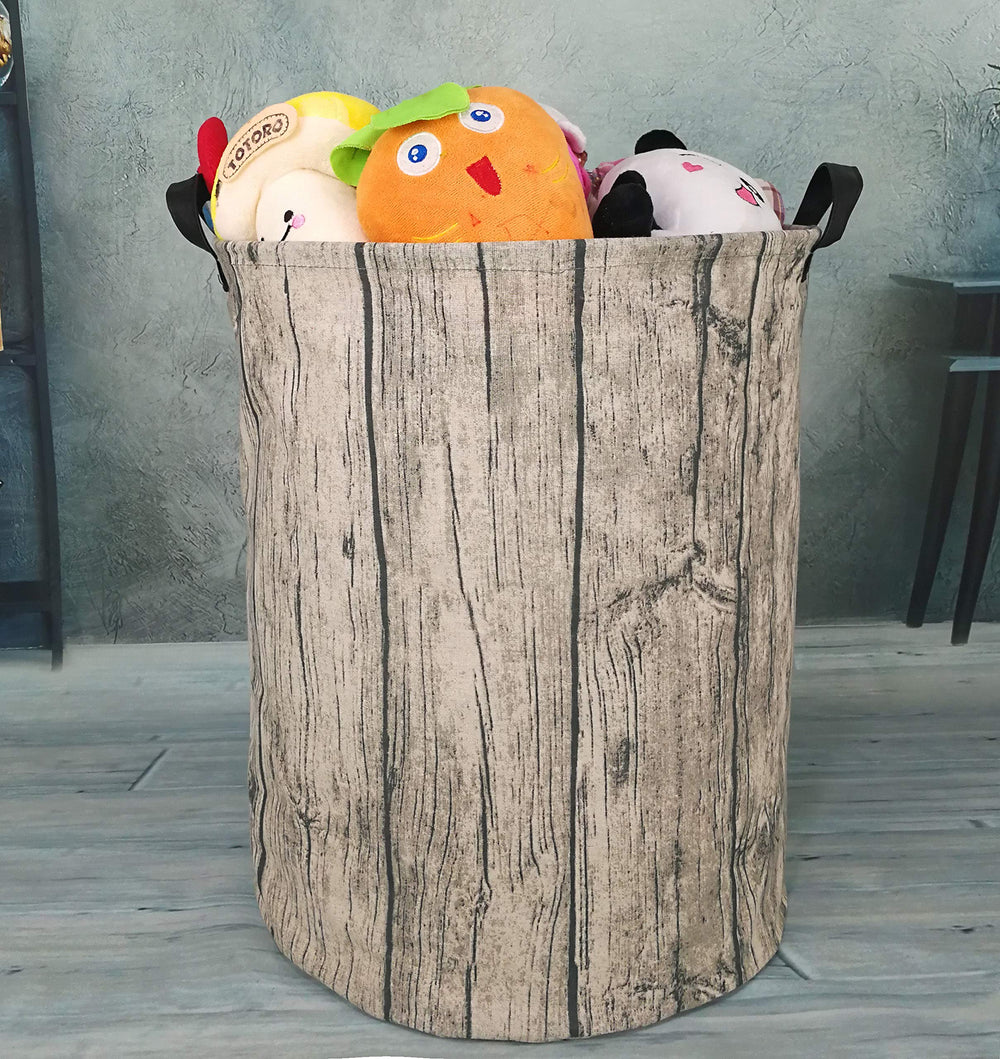 KUNRO laundry hamper tree stump handle closeup showing easy carrying and portability.