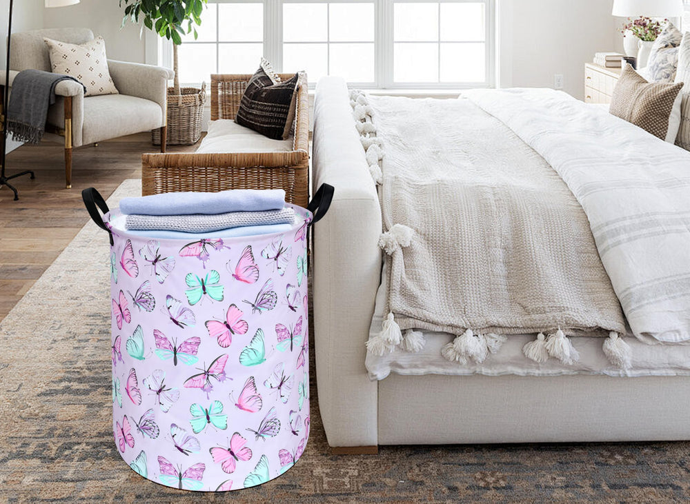 KUNRO round laundry basket made from linen-cotton blend with waterproof lining for durability.