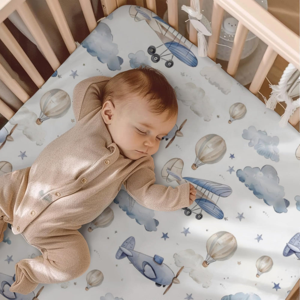KuphiL10C plane-hot-air-balloons-crib-sheet-03 durable fabric and elastic fit for secure mattresses.