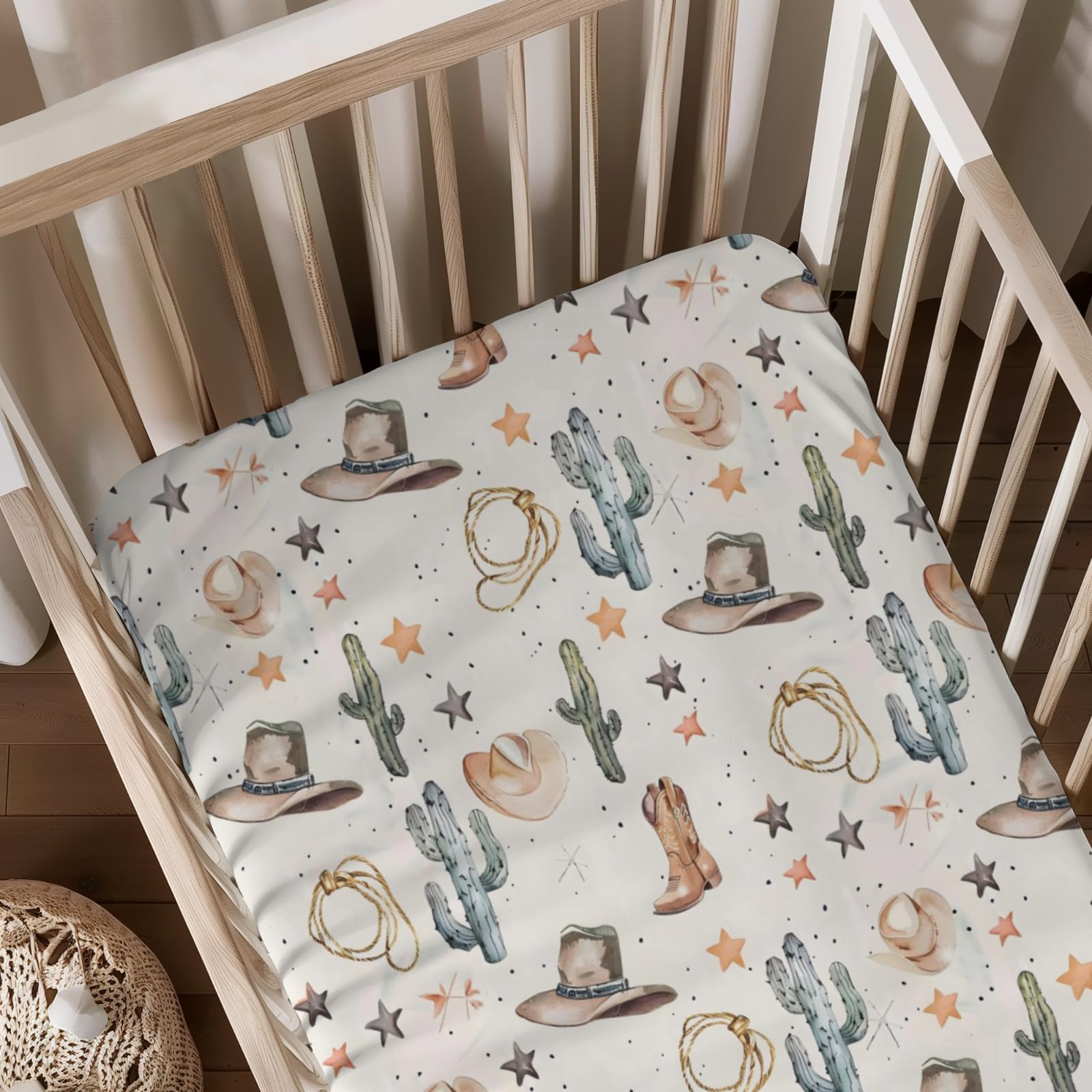 KuphiL10C western cactus hats stars pattern baby sheet close-up offers a soft, cozy sleeping surface.