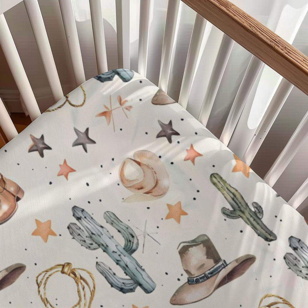 KuphiL10C western cactus hats stars pattern nursery sheet demonstrates versatile styling for any nursery.