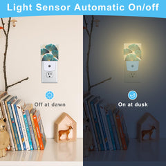 KXWQTRDD Ginkgo Leaves night light in a kids' bedroom with warm glow.