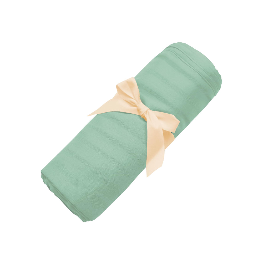 KYTE BABY 46x46 inch swaddle blanket in Matcha offers generous coverage and comfort