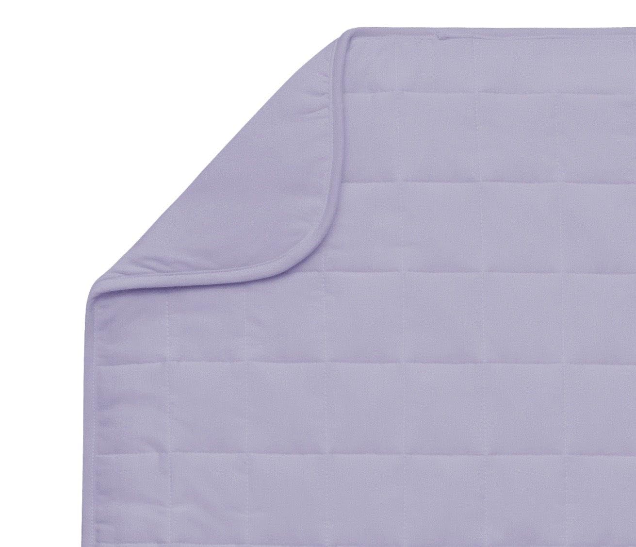Kyte BABY blanket in Taro neatly folded offers soft warmth for naps.