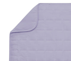 Kyte BABY blanket in Taro neatly folded offers soft warmth for naps.