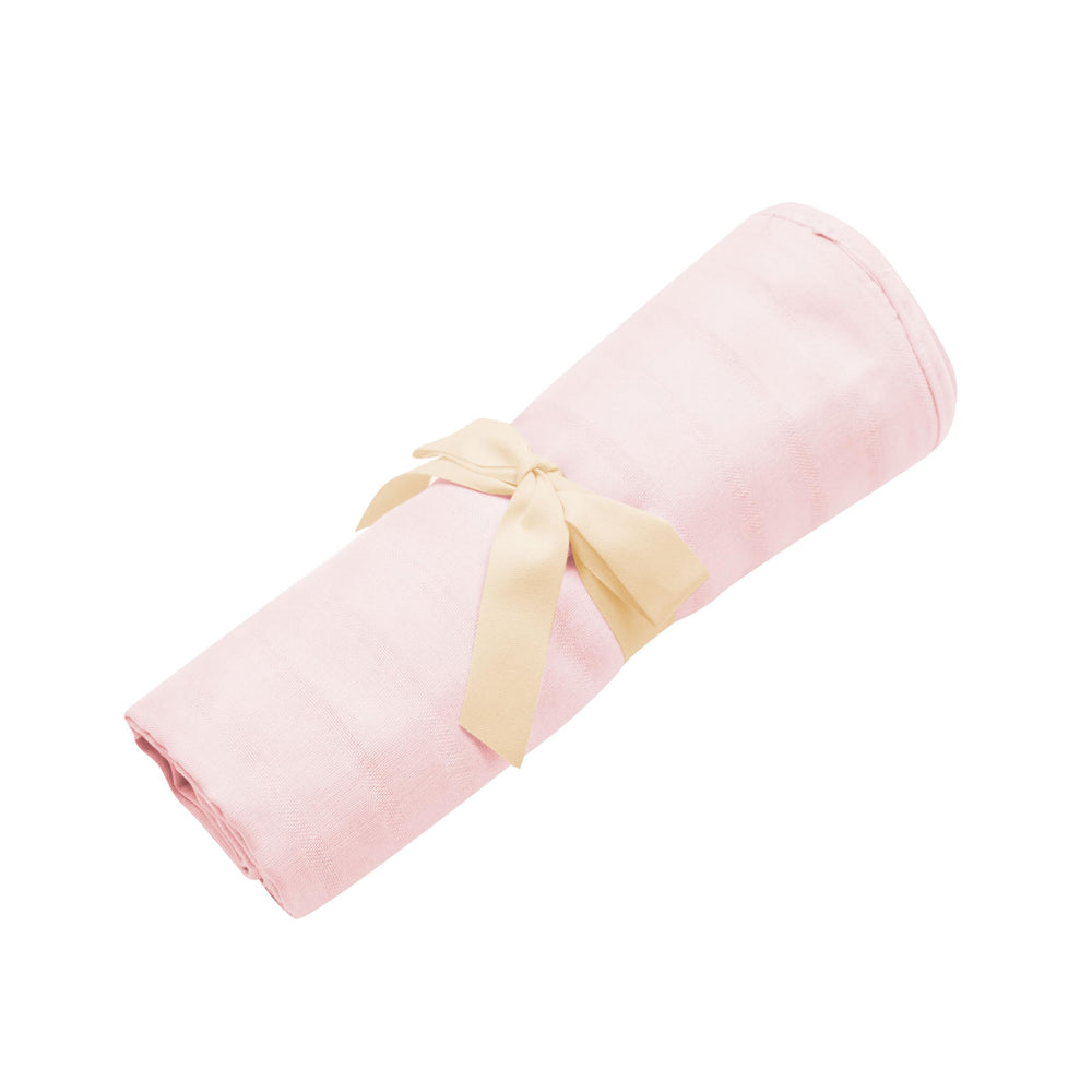 KYTE BABY Ballet swaddle blanket baby wrapped snugly demonstrates soothing sleep use.