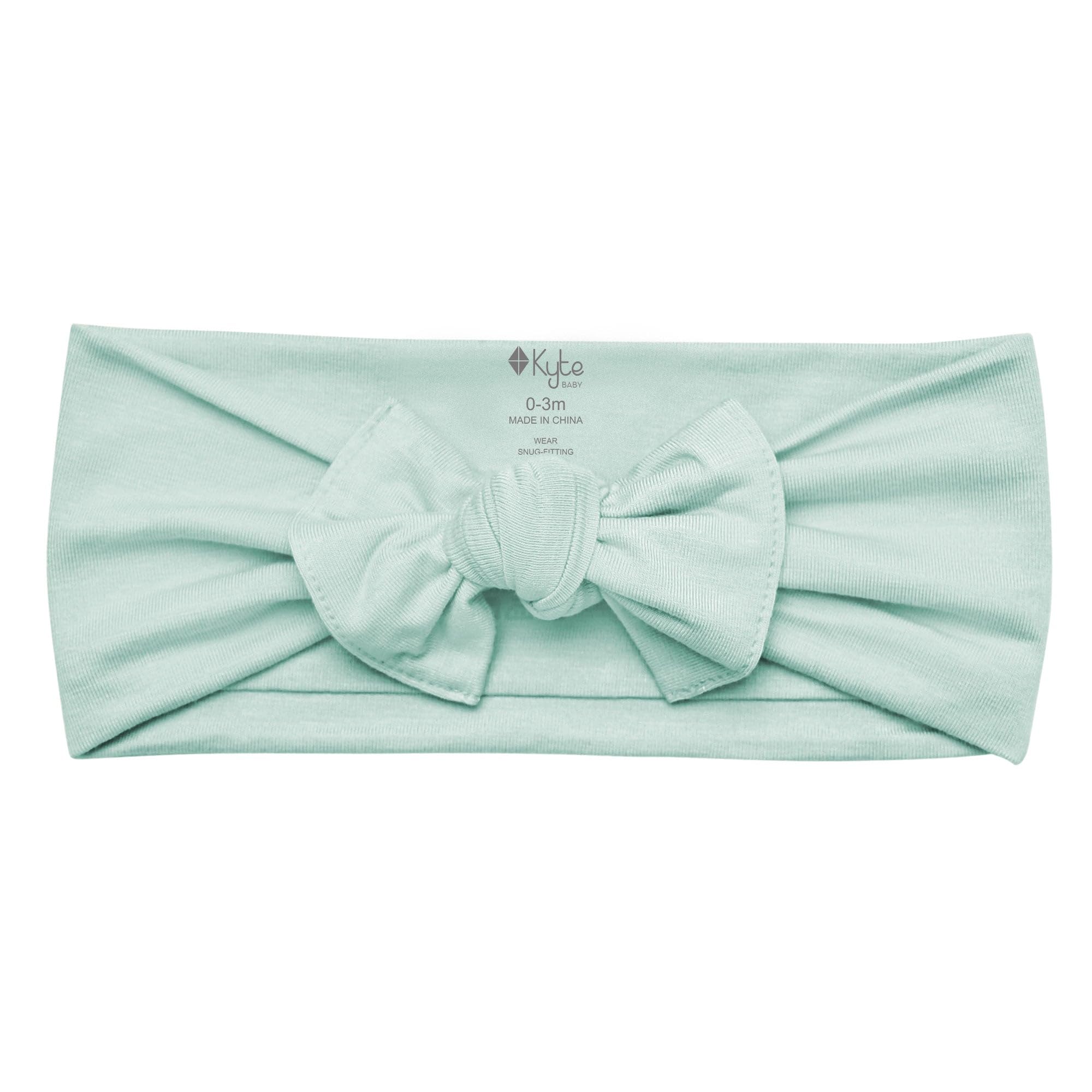 KYTE BABY bamboo bow sage back view highlights adjustable stretch for secure, gentle fit.