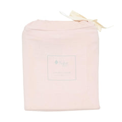 KYTE BABY car seat cover in blush folded closeup highlights lightweight fabric ideal for on-the-go moms.