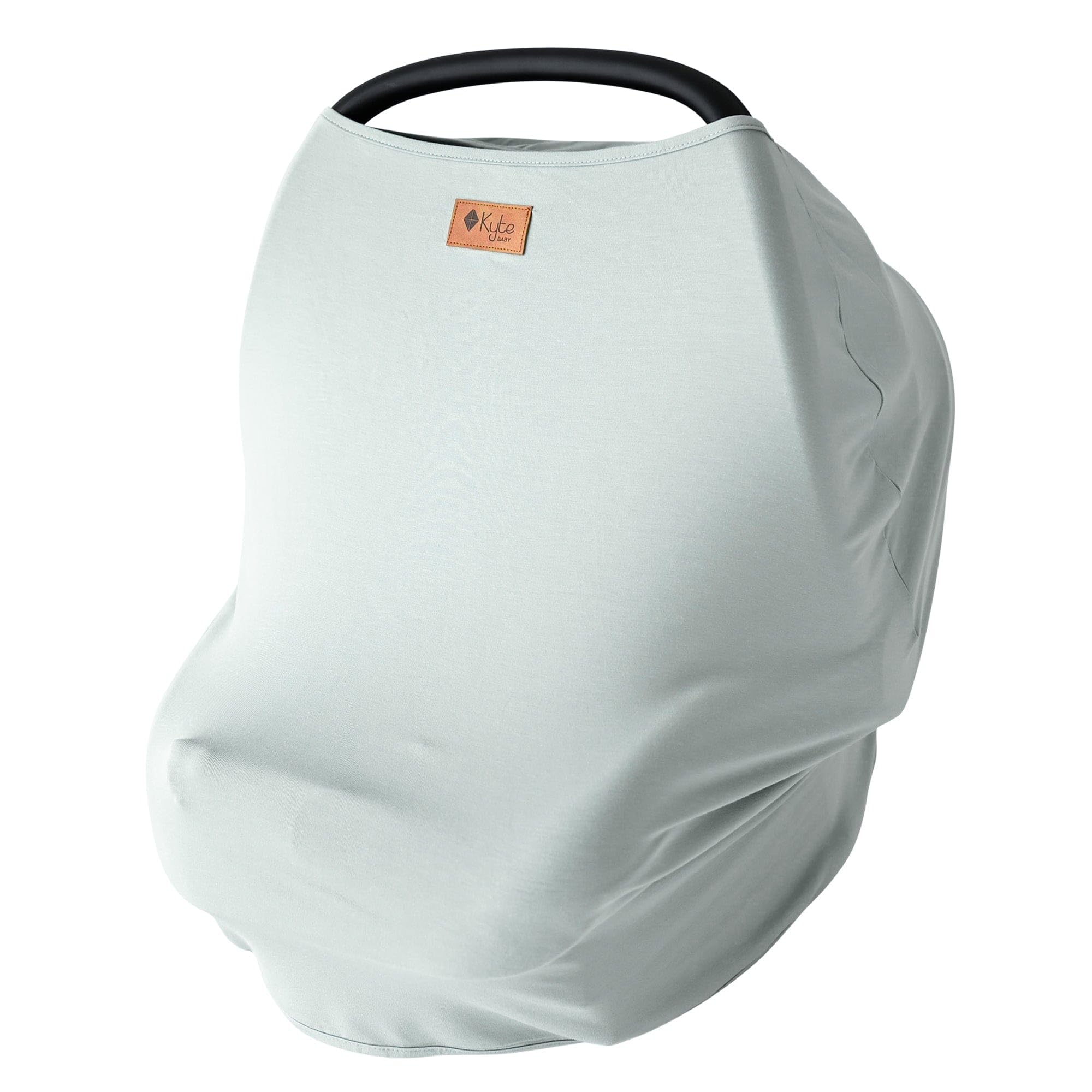 KYTE BABY Sage car seat cover folded for compact storage, showing soft bamboo fabric