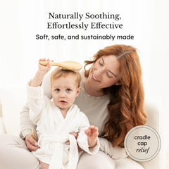 Kyte Baby cradle cap brush closeup shows natural materials and smooth edges.