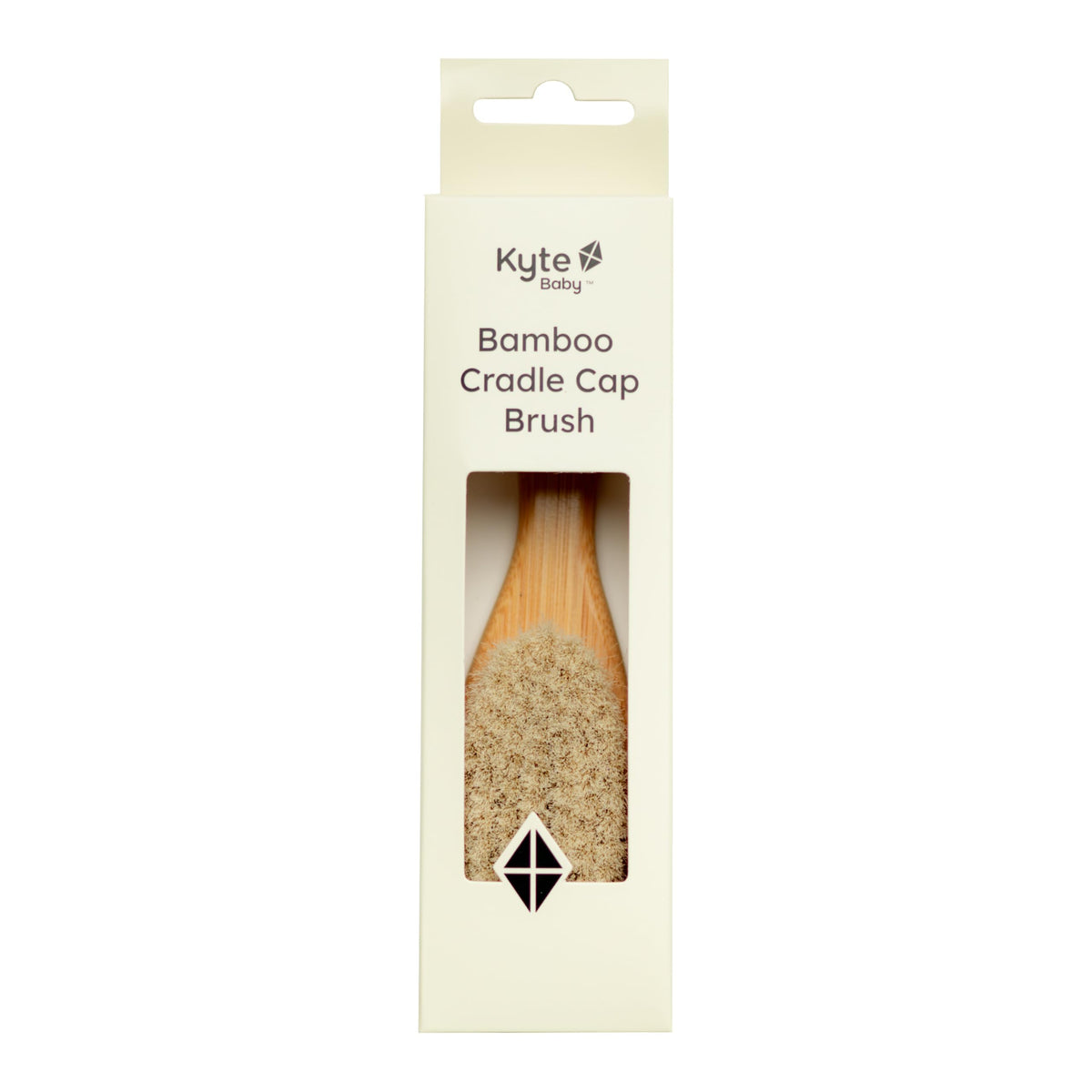 Kyte Baby cradle cap brush with goat hair bristles delivers gentle scalp massage.