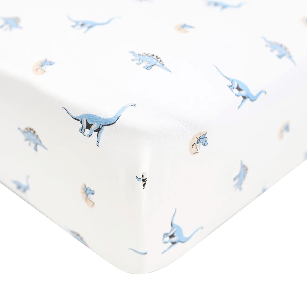 Kyte Baby Jurassic crib sheet close-up shows bamboo softness for baby comfort.