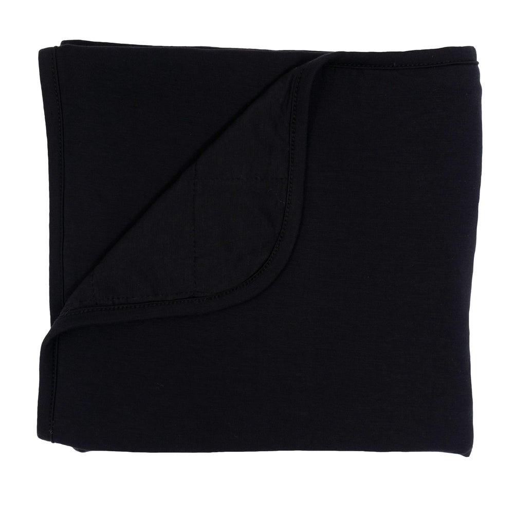 Kyte Baby Midnight bamboo blanket close-up for ultra-soft nursery comfort.