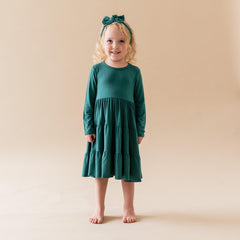 KYTE BABY bamboo bow emerald adjustable ties easily for a growing baby’s perfect fit.