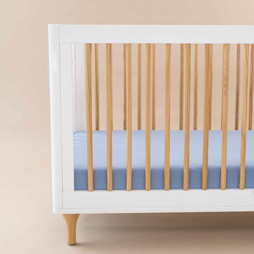 Kyte Baby slate crib sheet texture highlighting breathable bamboo rayon with slight stretch.
