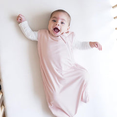 KYTE BABY sleep bag worn on baby demonstrates cozy, safe layering for overnight rest.