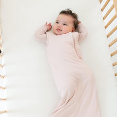KYTE BABY sleep bag with J-shaped zipper enables quick diaper changes.