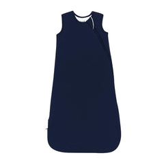 KYTE BABY navy sleep bag close-up shows breathable bamboo fabric for comfort.