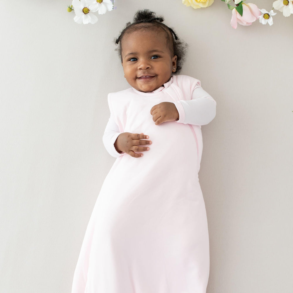 Kyte Baby sleep bag Sakura back view demonstrates roomy fit for toddlers' coziest nights.