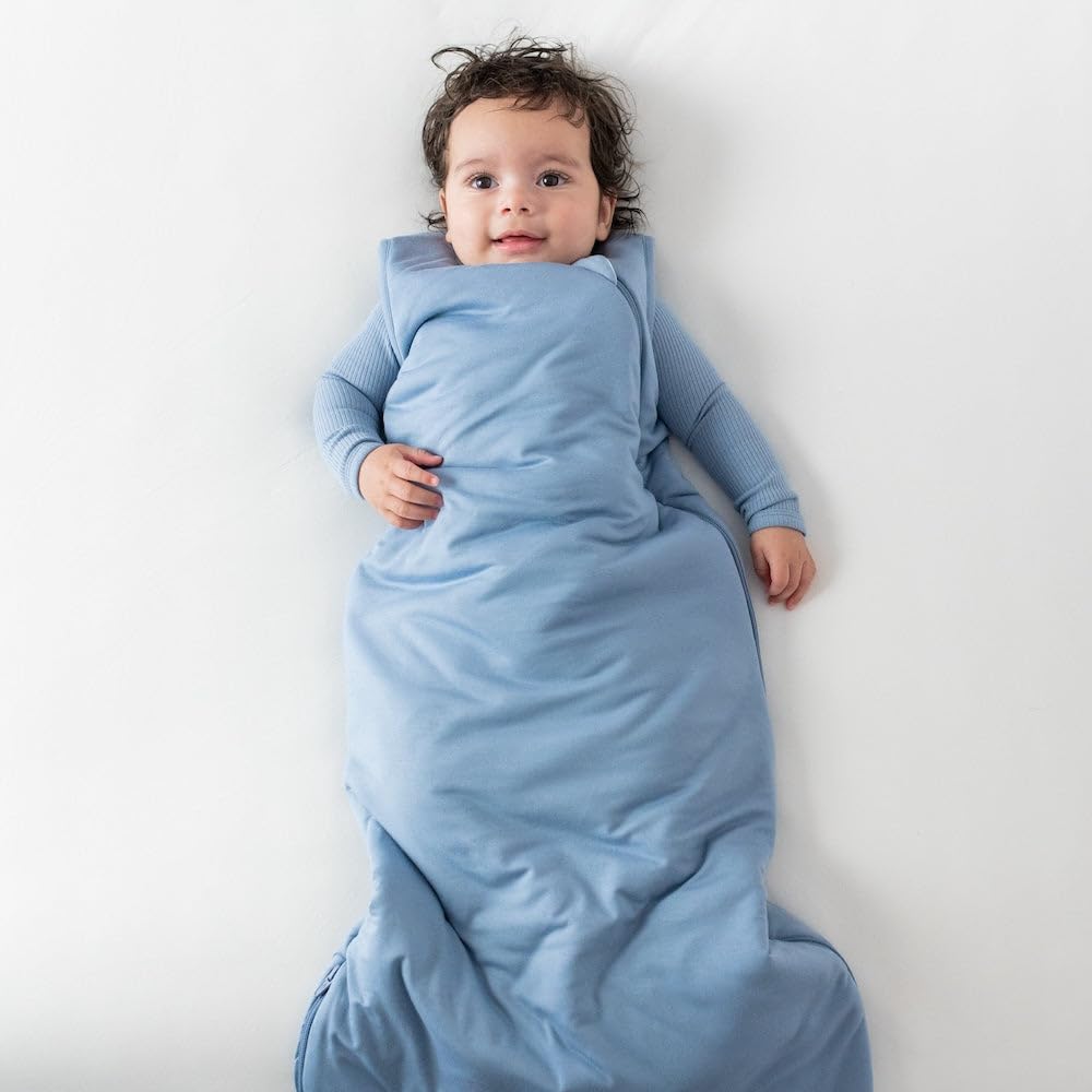 KYTE BABY sleep bag slate worn as wearable blanket during nap time.