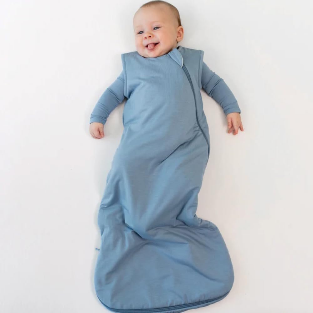 KYTE BABY sleep bag fabric closeup highlights soft texture and stretch for easy layering.