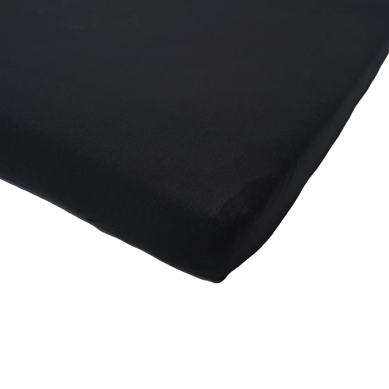 Kyte Baby crib sheet Midnight demonstrates snug-fitted design for quick, secure sleep-ready setups.