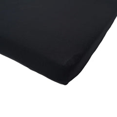 Kyte Baby crib sheet Midnight demonstrates snug-fitted design for quick, secure sleep-ready setups.
