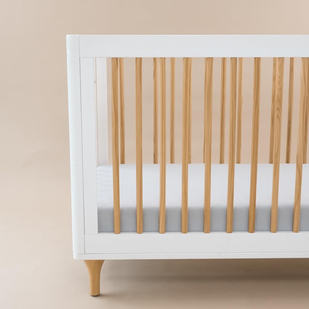 Folded KYTE BABY Soft Crib Sheet Storm demonstrates compact storage.