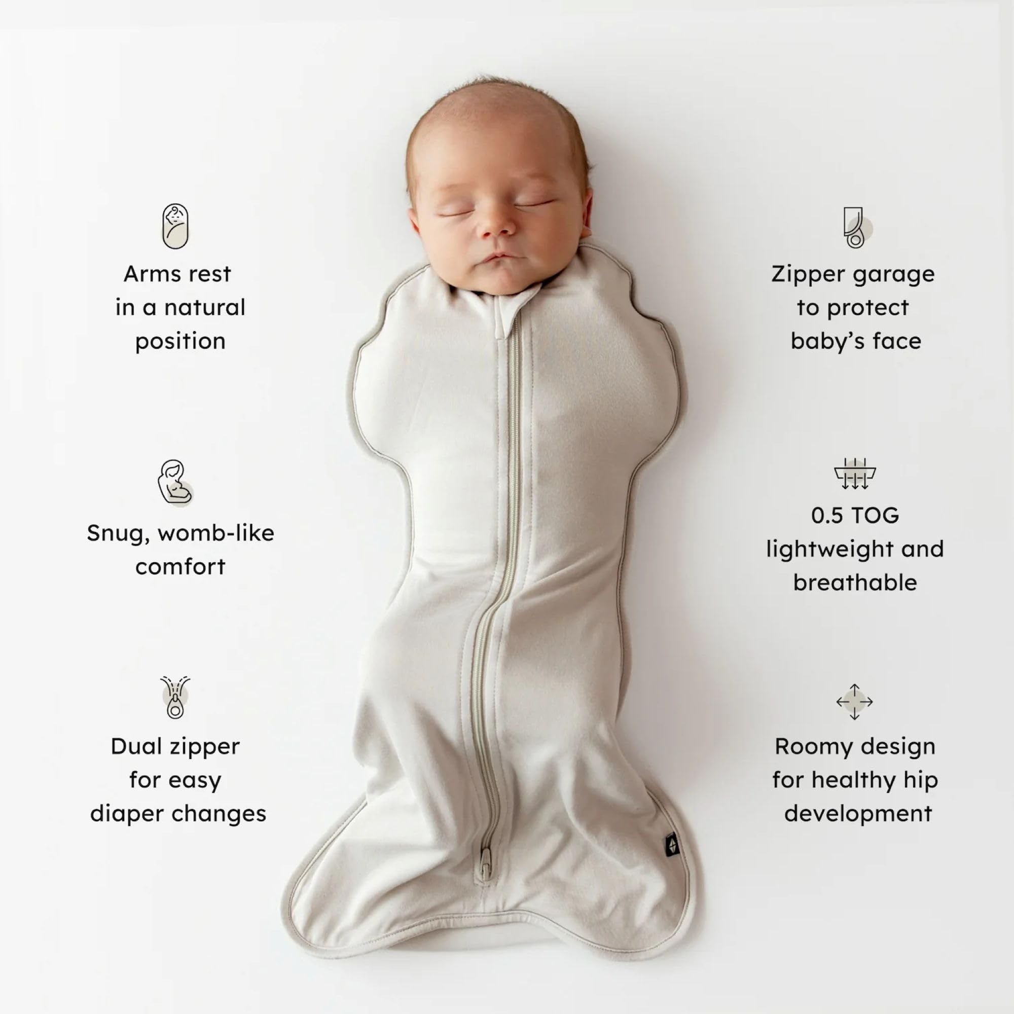 KYTE BABY Swaddle Bag Blush Butterfly zipped closed for a secure, easy swaddle