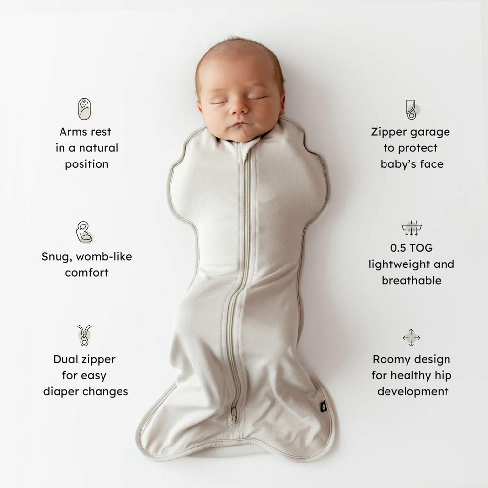 KYTE BABY Swaddle Bag Blush Butterfly zipped closed for a secure, easy swaddle